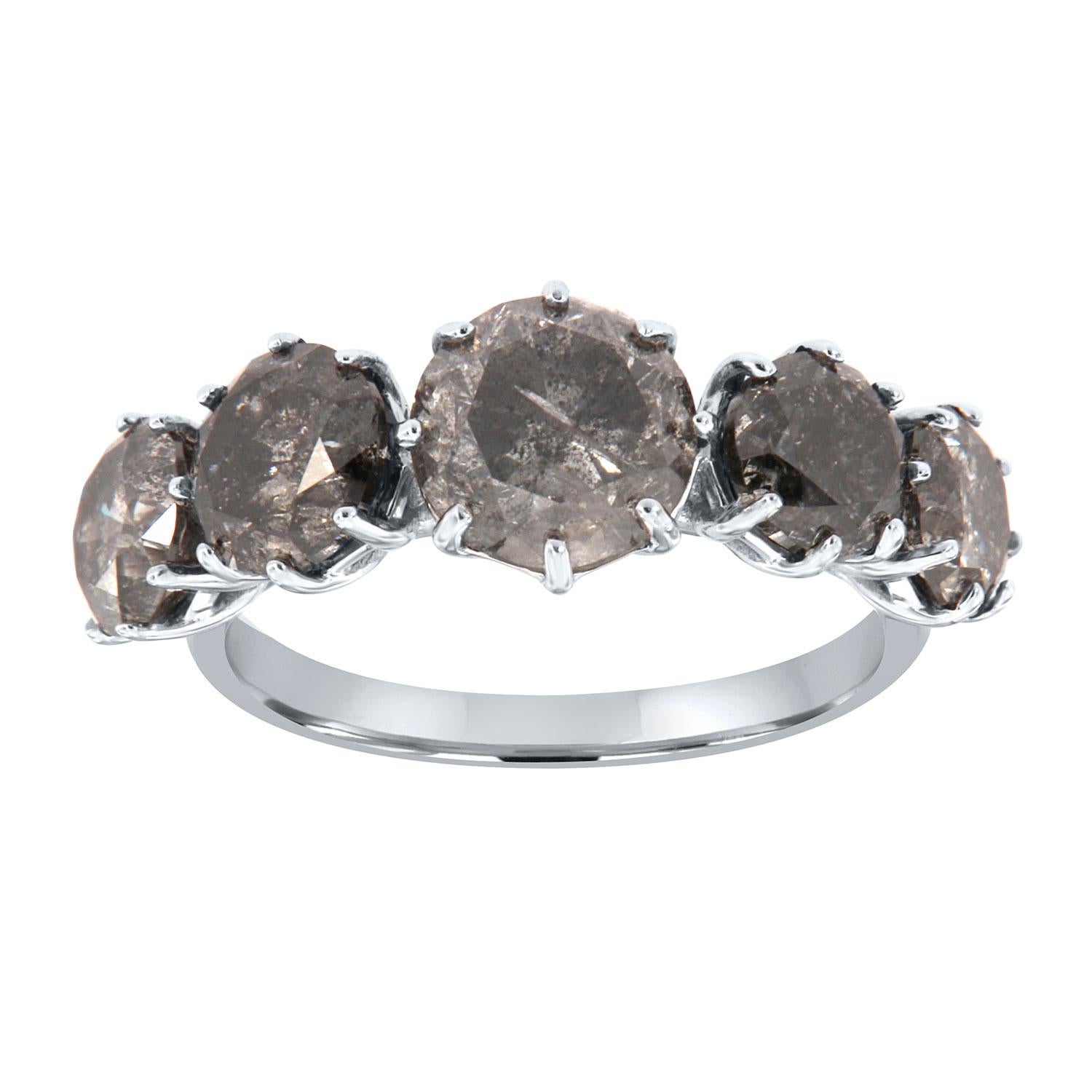 This 14k white gold rustic ring features five (5) Round shape Salt and Pepper diamonds set in delicate six (6) delicate prongs, each on a 1.8 mm wide hammered band.  
The total weight of the diamonds is 4.16 Carat. The center diaomnd is 1.54 carat.
