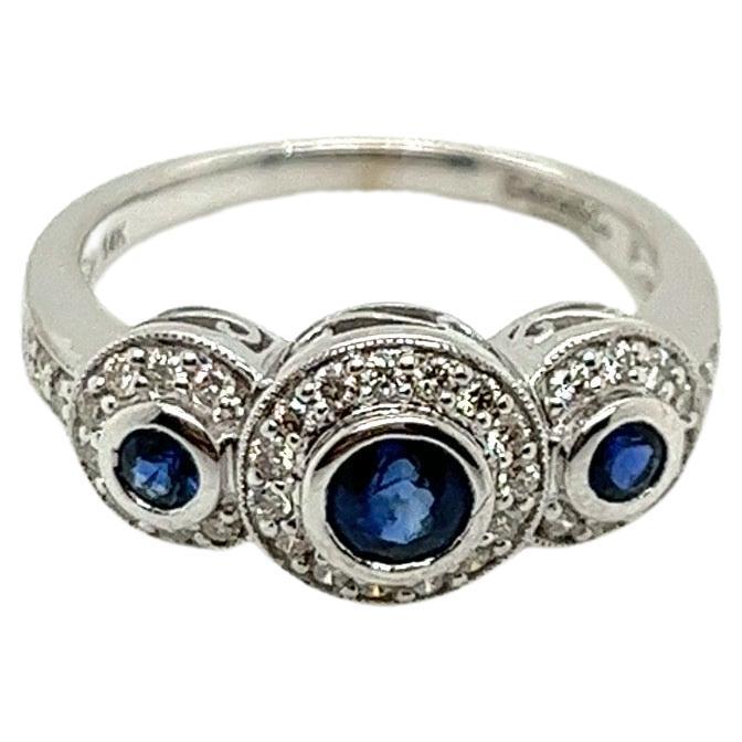 14K White Gold Sapphire and Diamond 3 stone Halo Ring For Sale
