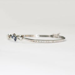 Armband aus 14 Karat Weißgold mit Saphiren und Diamanten