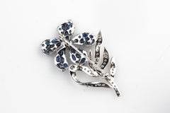 14 Karat White Gold Sapphire and Diamond Flower Brooch TCW = 9.81 Carat