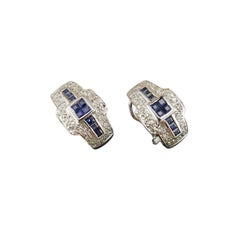 Orecchini Omega Back con zaffiro e diamante in oro bianco 14K #23346