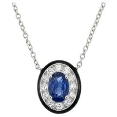Colgante de zafiro y diamante de oro blanco de 14 quilates