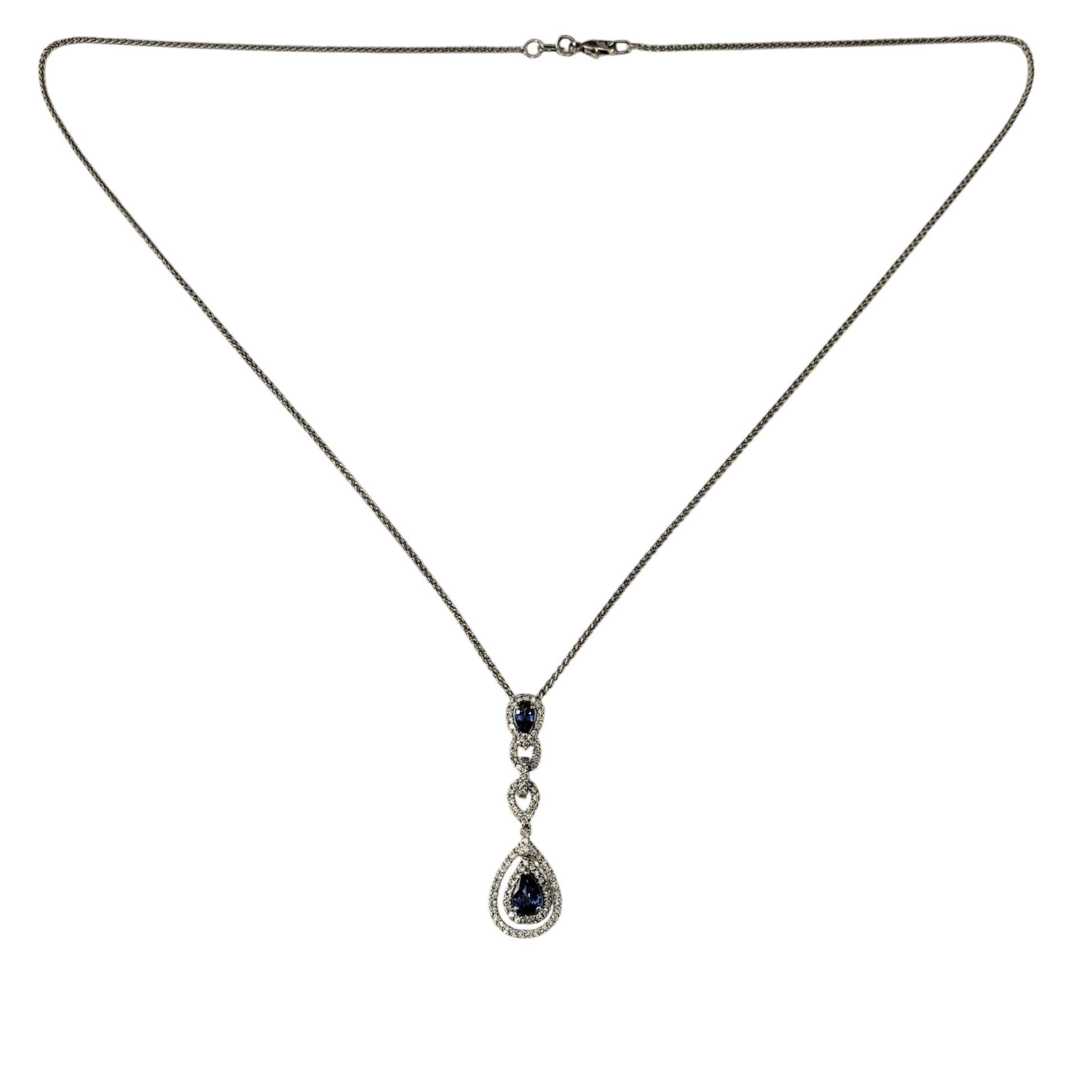14K White Gold Sapphire and Diamond Pendant Necklace JAGi Certified-

This stunning pendant necklace features two pearl cut natural blue sapphires and 93 round brilliant cut diamonds set in 14K white gold. Suspends from a classic 14K white gold