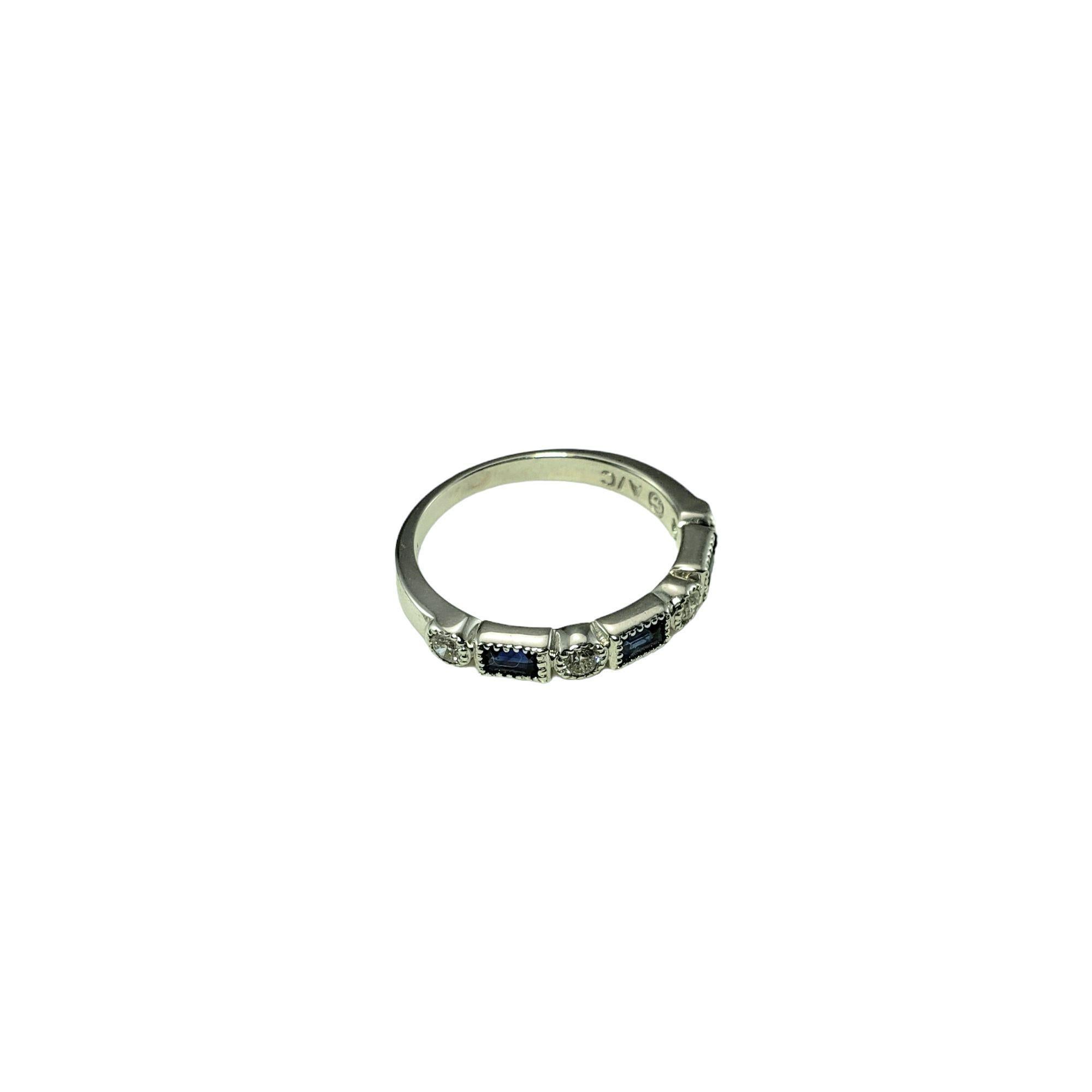 14 Karat White Gold Sapphire and Diamond Ring Size 5.75 JAGi Certified-

This elegant ring features three emerald cut sapphires and four round brilliant cut diamonds set in beautifully detailed 14K white gold. Width: 3 mm. Shank: 2 mm.

Total