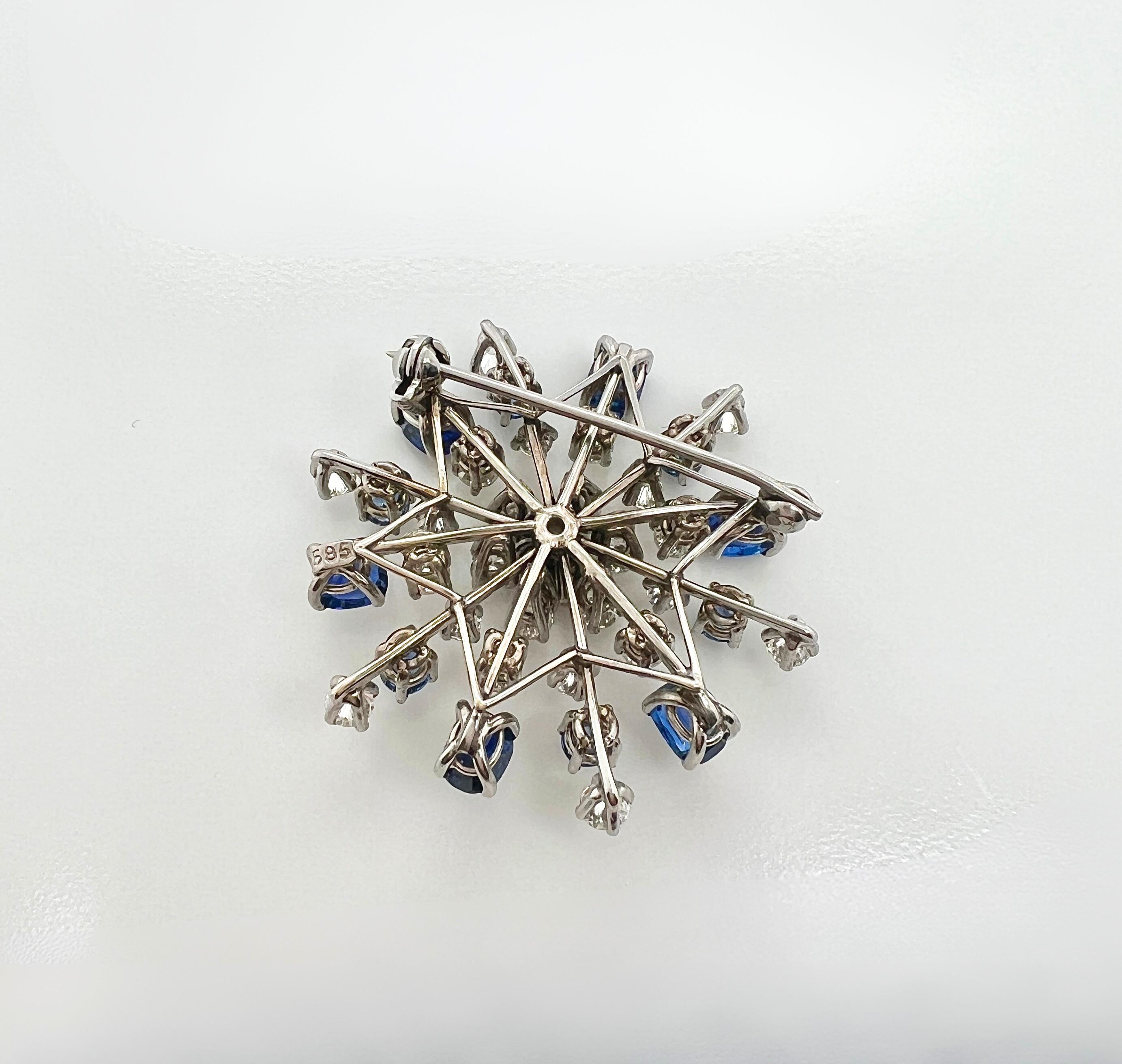 Broche flocon de neige en or blanc 14k saphir et diamant

Détails :
Dimensions : 3,3 cm x 3 cm
Poids : 7,5 grammes
Poinçonné : 585

En excellent état.