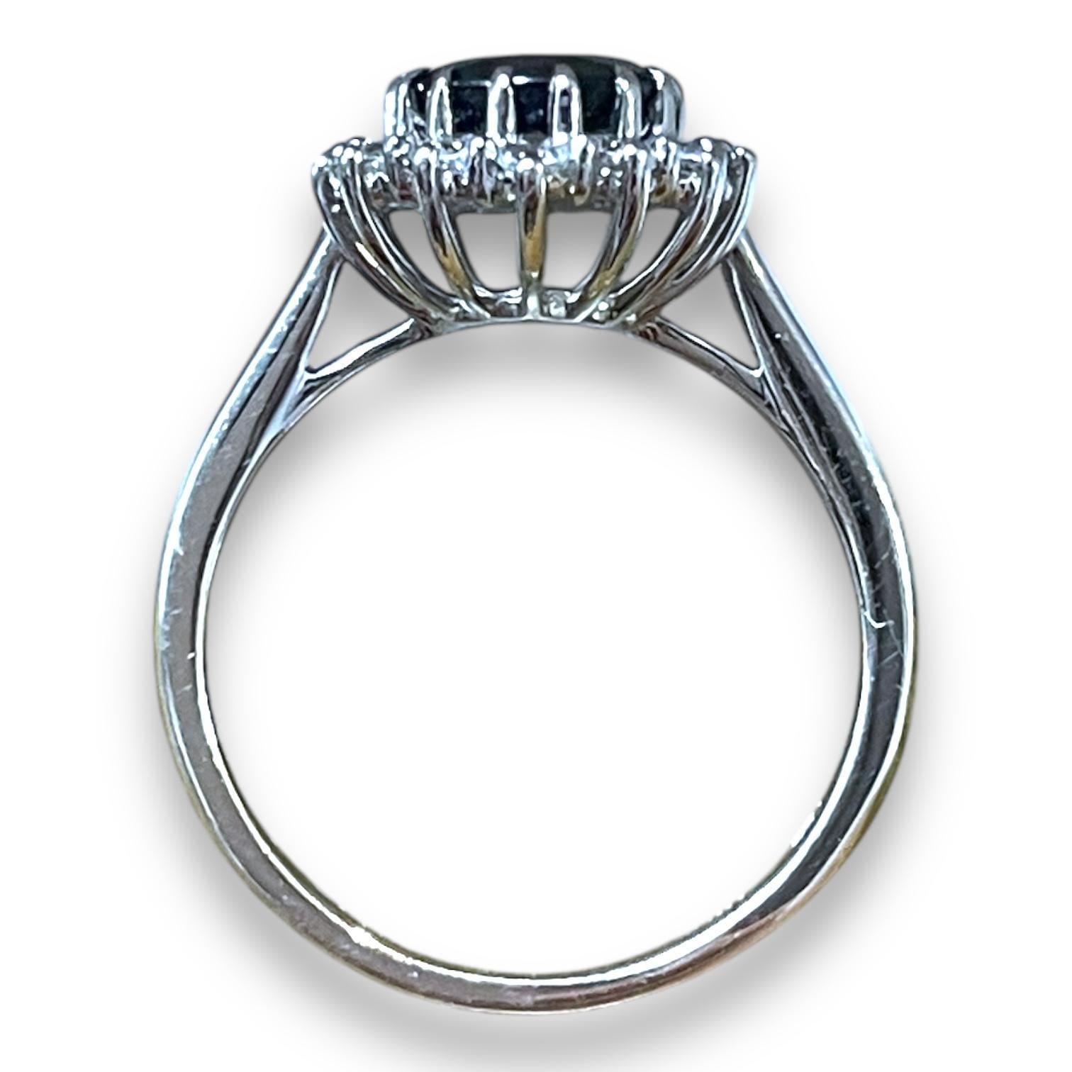 Oval Cut 14K White Gold Sapphire and Diamond Sunburst Ring