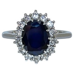 Sonnenschliff-Ring aus 14 Karat Weißgold mit Saphir und Diamant
