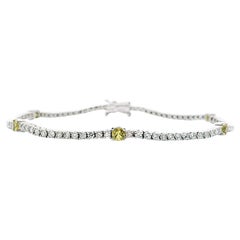 Bracelet tennis en or blanc 14 carats avec saphirs et diamants