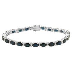 Bracelet tennis en or blanc 14 carats avec saphirs et diamants