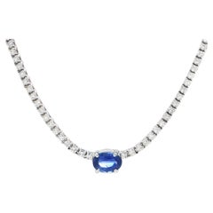 Collana tennis in oro bianco 14 carati con zaffiro blu e diamanti