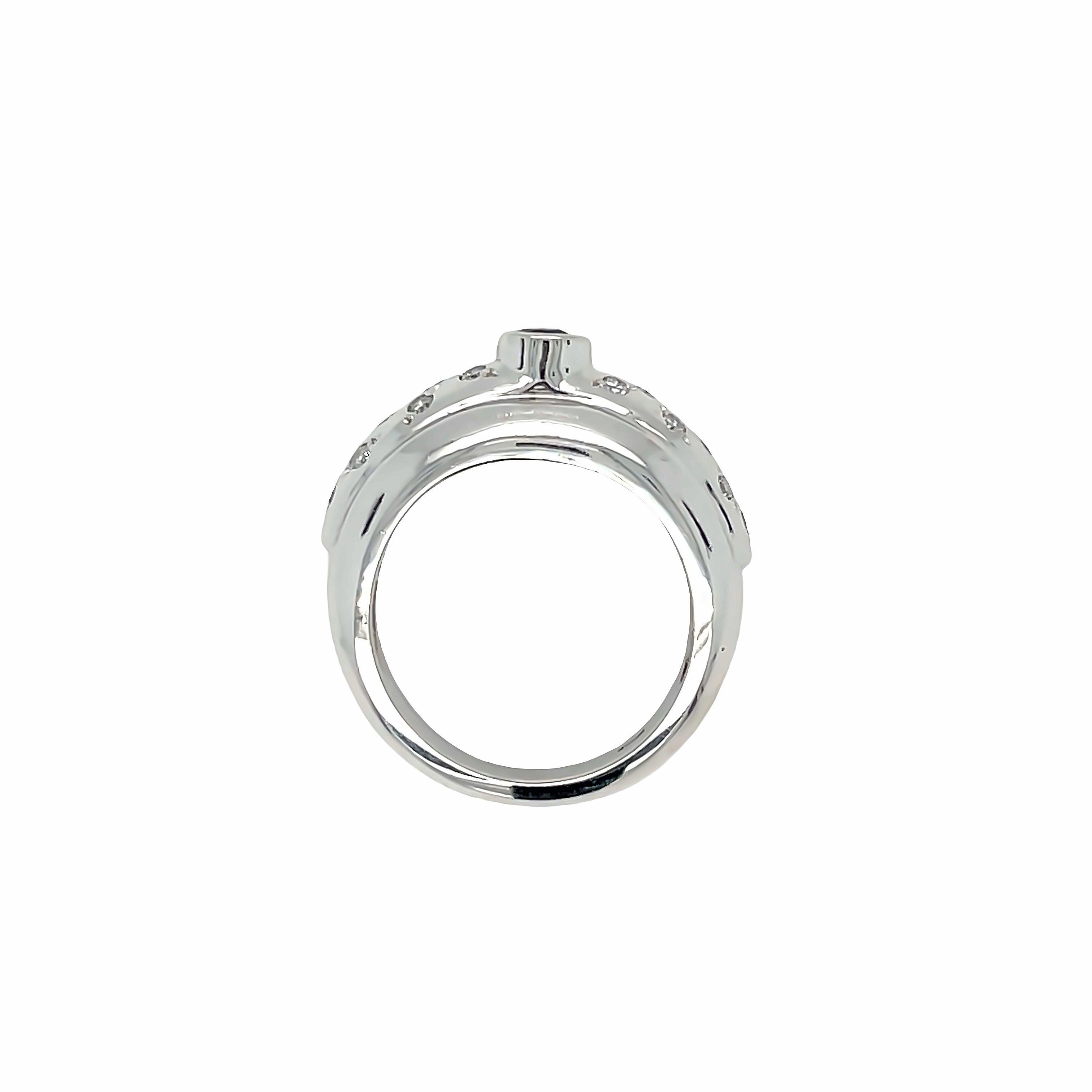 Elegant and contemporary, this 14K White Gold Sapphire Diamond Ring features a stunning round Sapphire weighing approximately 0.25 carat. Center Sapphire is beautifully showcased in a raised bezel setting, complemented by a dome setting adorned with