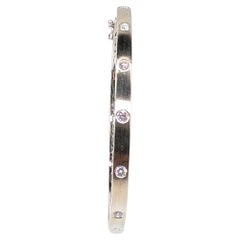 14K White Gold Satin Finish Bangle with 7 Round Diamonds Totaling .45ct