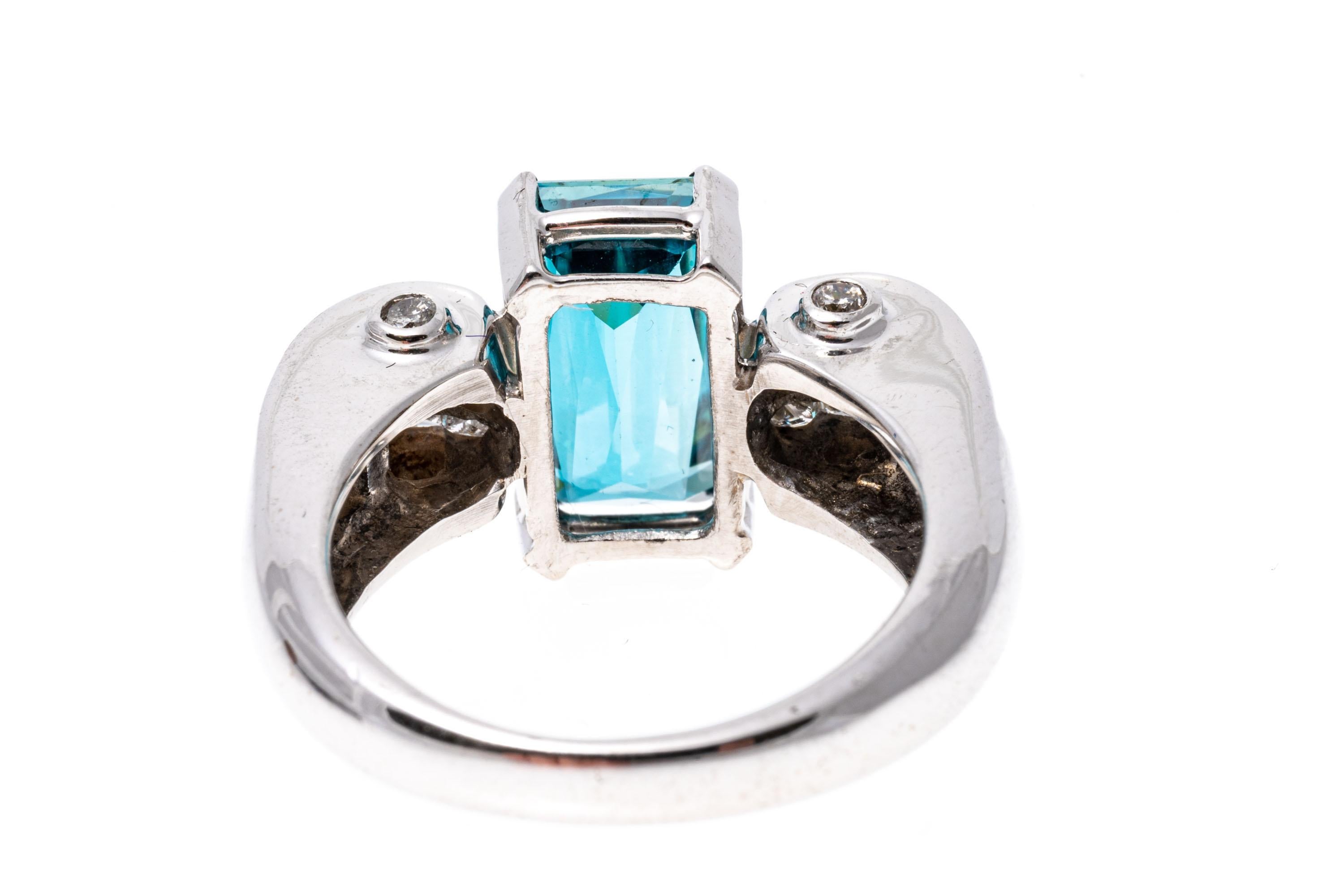 Women's 14k White Gold Scrolled Calibre Princess Cut Diamond And Blue Topaz Ring For Sale