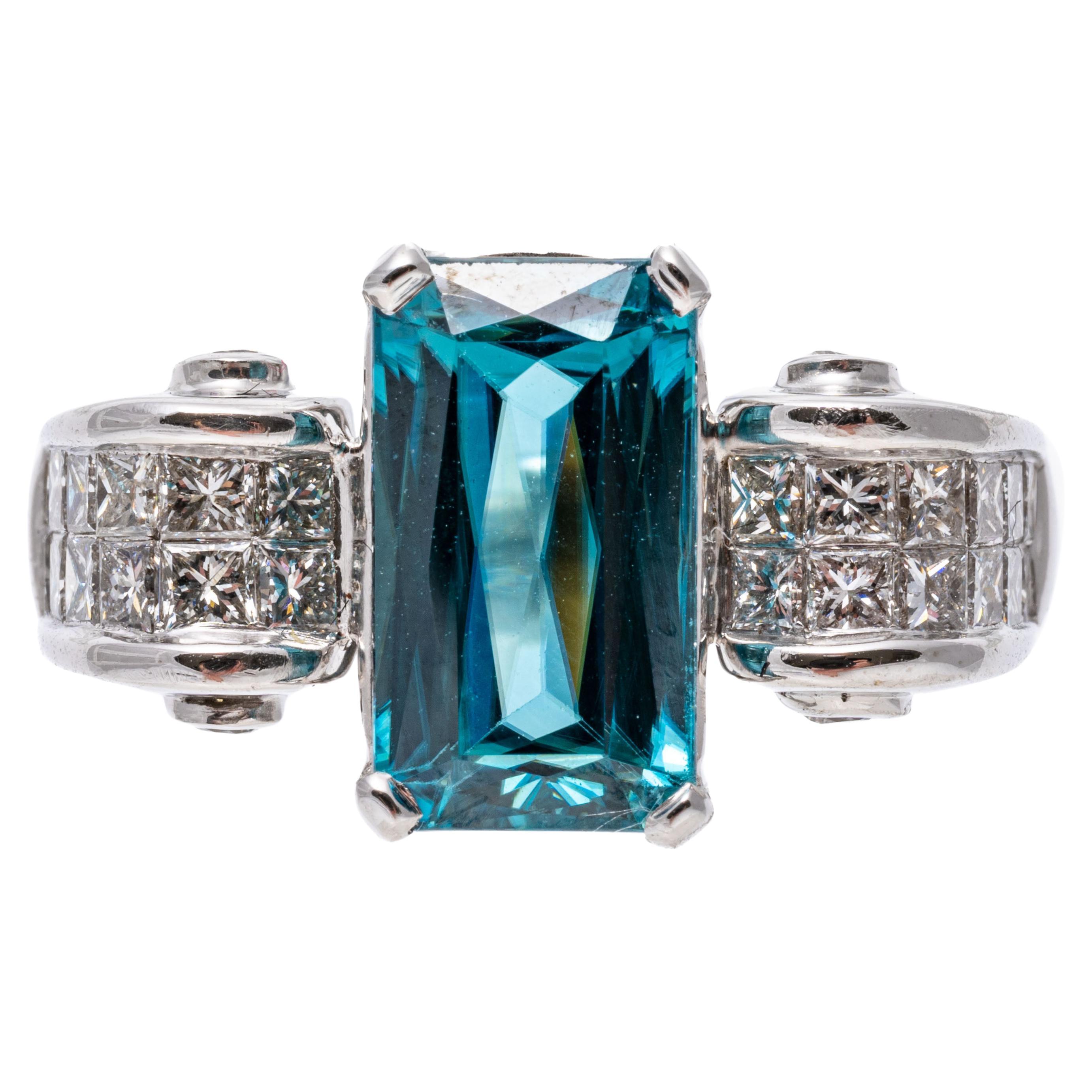 14k White Gold Scrolled Calibre Princess Cut Diamond And Blue Topaz Ring