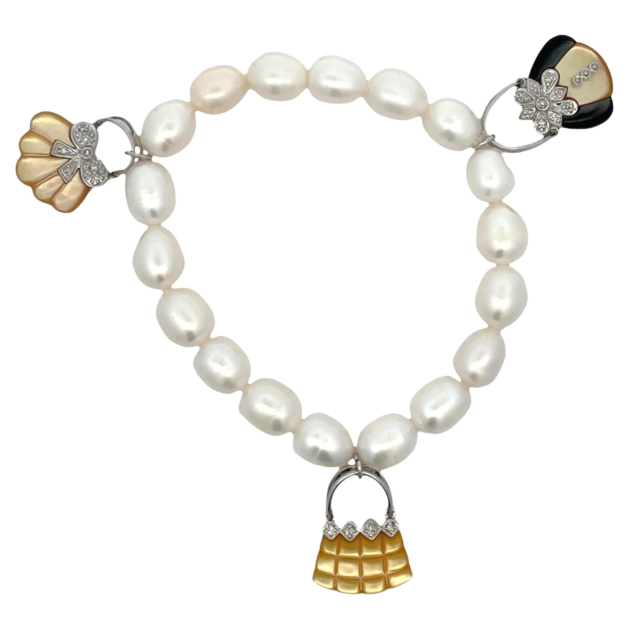 14k White Gold Shell, Mother of Pearl & Onyx Bag Charm Pearl Bracelet For Sale