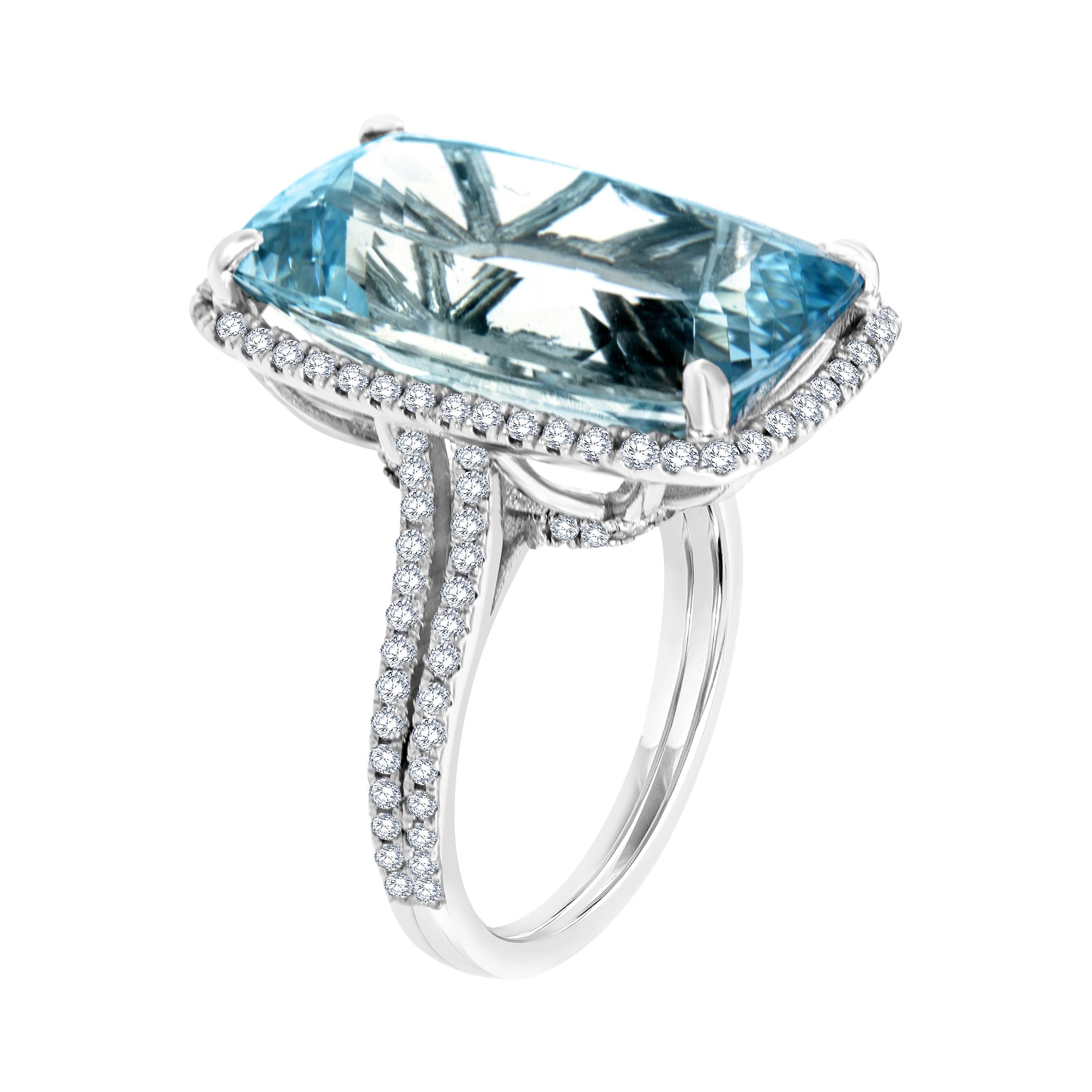 This one-of-a-kind ring features a rare Sky-Blue 13.72-carat cushion brilliant shape Aquamarine encircled by a halo of round brilliant diamond on a split shank. The delicate hidden halo underneath its crown adds to the glamour of this stunning ring.