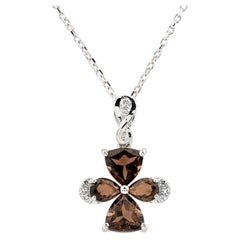 Ciondolo a croce infinita in quarzo fumé in oro bianco 14K