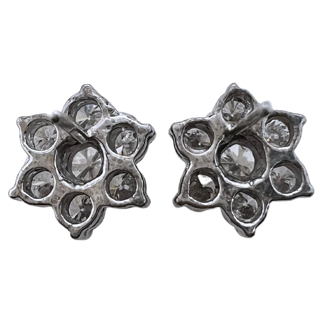 This classic snowflake style earring is timeless and perfect for daily wear.  The round brilliant diamonds are arranged in a beautiful snowflake style that dazzles and radiates! It's perfect for casual or smart casual wear.  It's a must have in your
