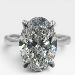 14k White Gold Solitaire Ring with 4.02Ct. Lab Grown Oval Diamond. (Size 5.75)