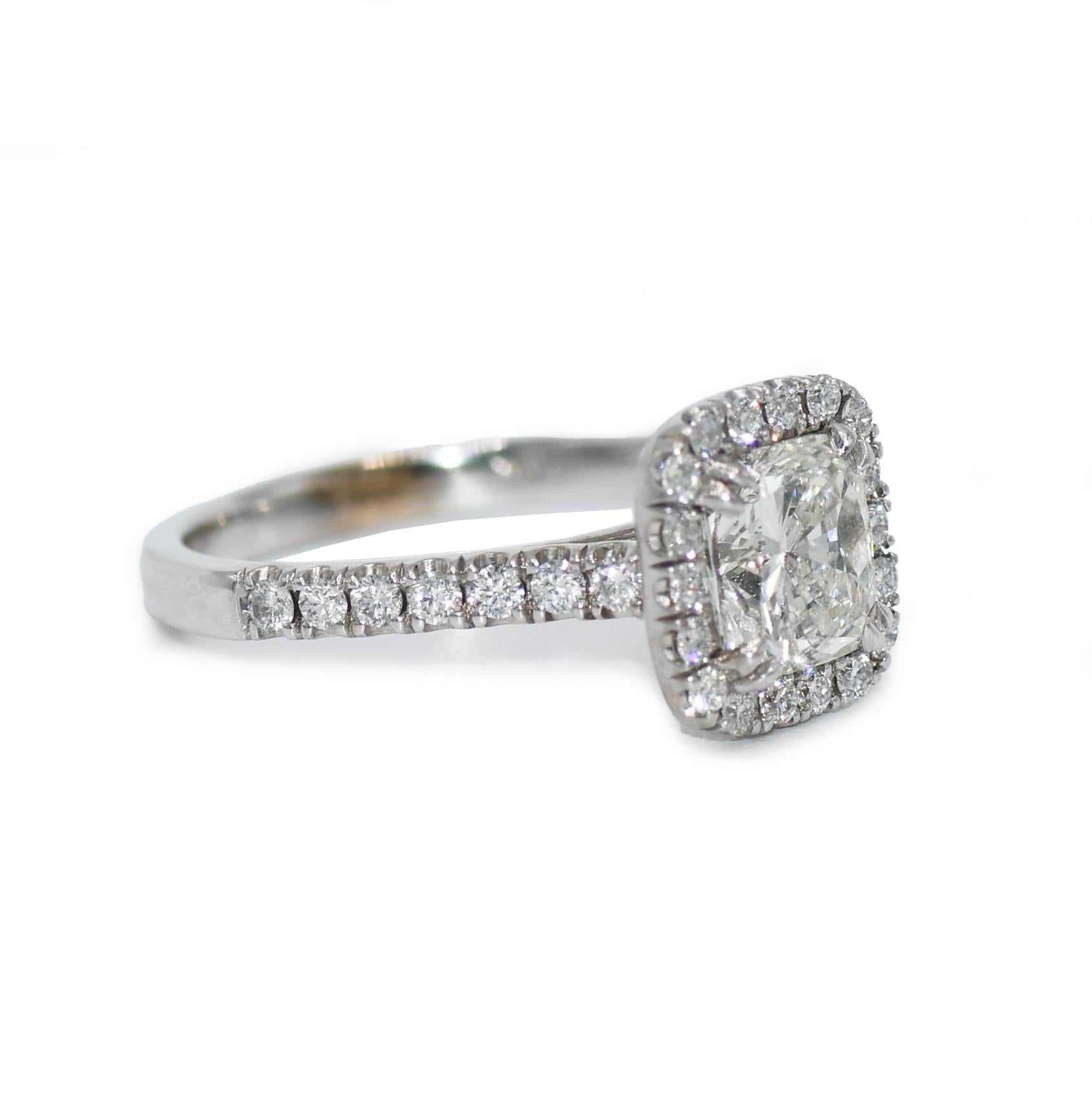Ladies' engagement ring with square modified brilliant center diamond in 14k white gold setting.
Stamped 14k and weighs 3.6 grams.
The center diamond is K to L color, Vs clarity, 1.50 carats.
The side diamonds are round brilliant cuts, .50 total