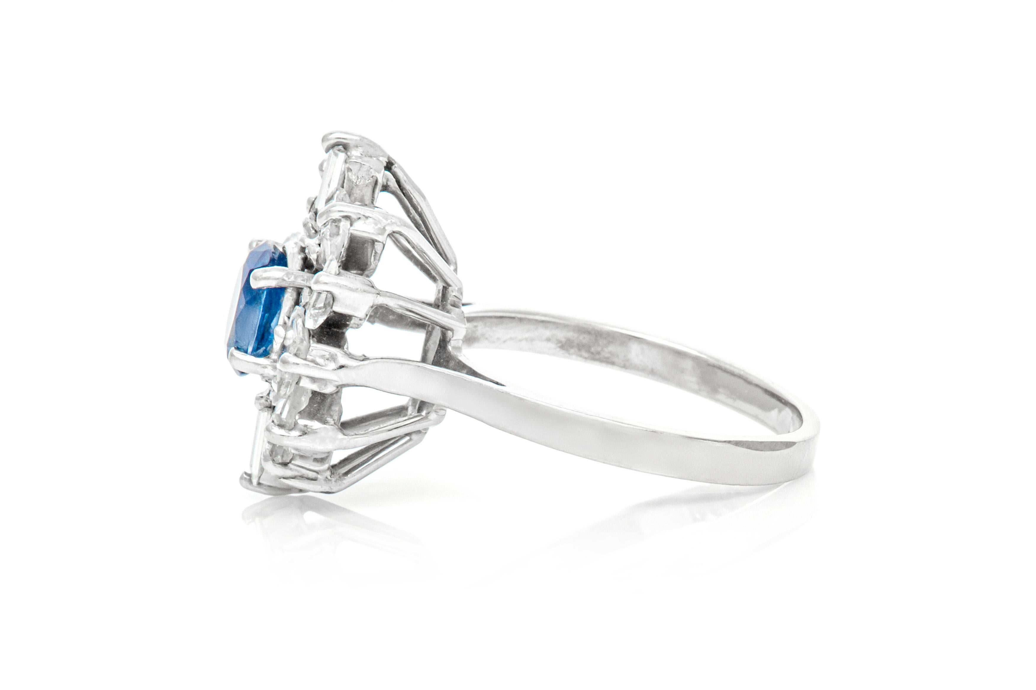 The ring is finely crafted in 14k white gold.
With sapphire approximately weighing total of 1.00 carat and diamonds approximately weighing total of 1.20 carat.
