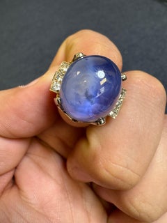 Ring aus 14 Karat Weißgold mit Sternsaphir und Diamant
