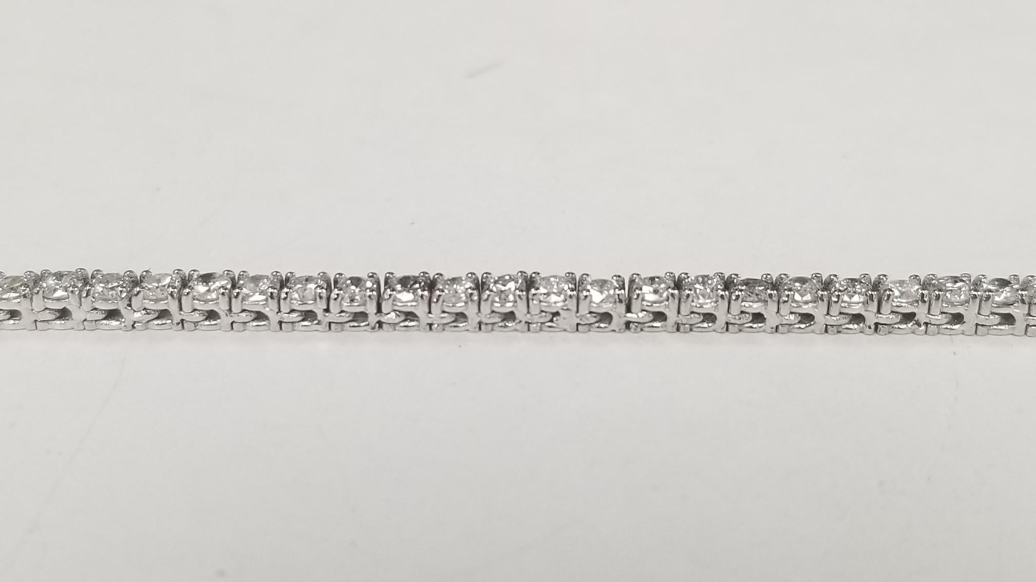 Contemporary 14k White Gold Straight Diamond Tennis Bracelet 6.01cts For Sale