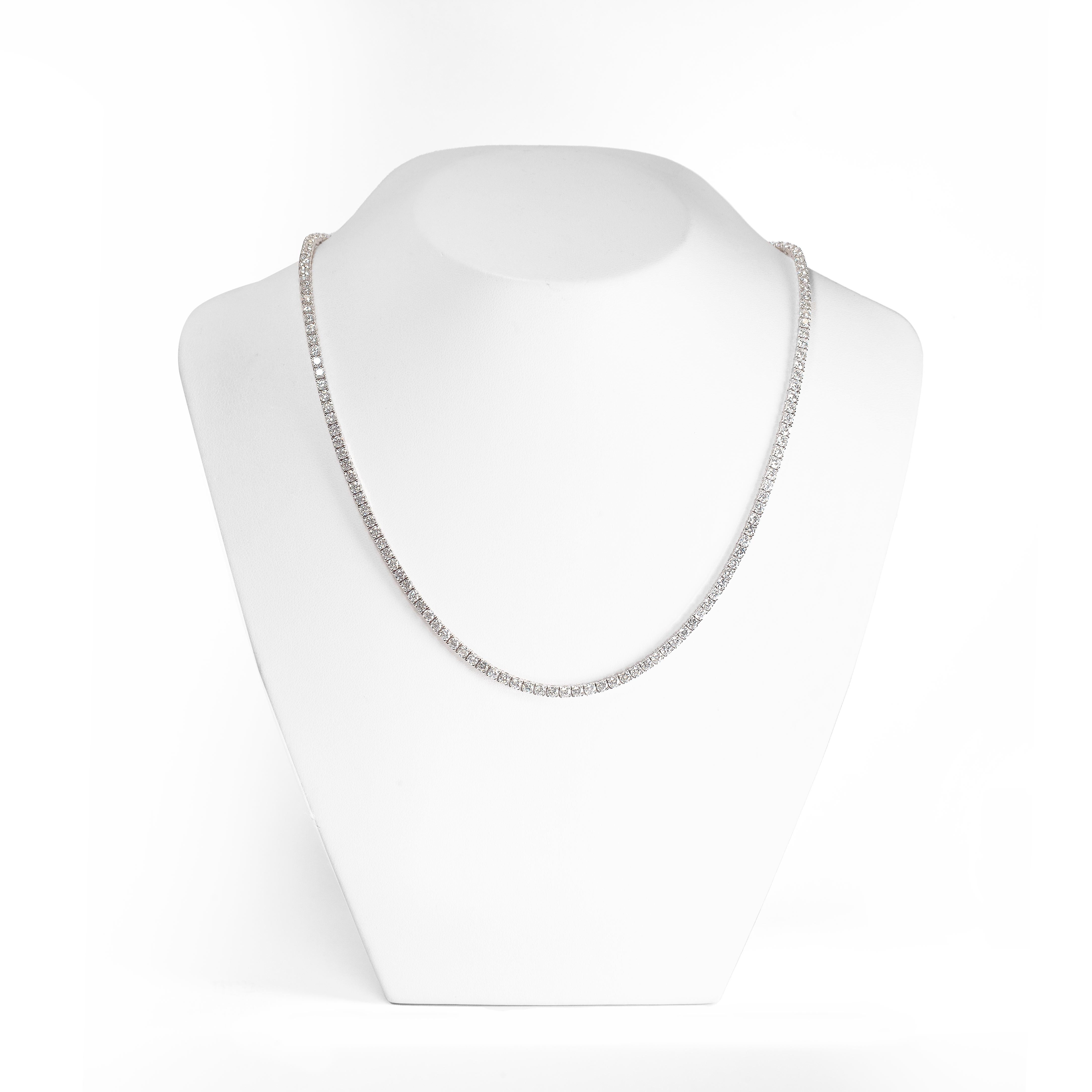Experience the allure of exquisiteness with this wonderful tennis necklace, expertly crafted in 14 carat white gold. 

This timeless piece features 154 round brilliant cut diamonds, all matched in size perfectly to create a seamless line of striking