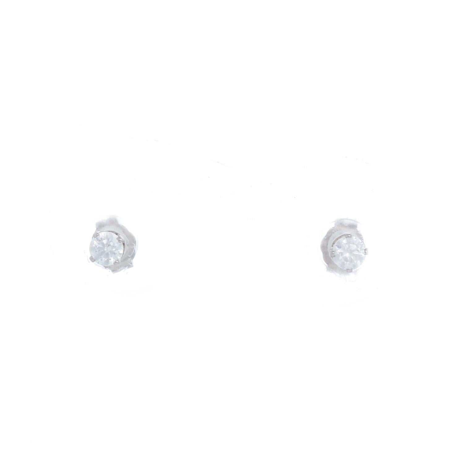 14k White Gold Studs .25 cts - Dainty 14K White Gold studs weighing .25 carats. Color H clarity - VS2 - Perfect for a first pair of studs! 