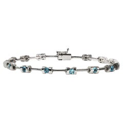 Bracciale con pietre blu sintetiche in oro bianco 14K 13,8g