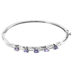 Bracciale con tanzanite e diamanti da 1/3 di carato in oro bianco 14K