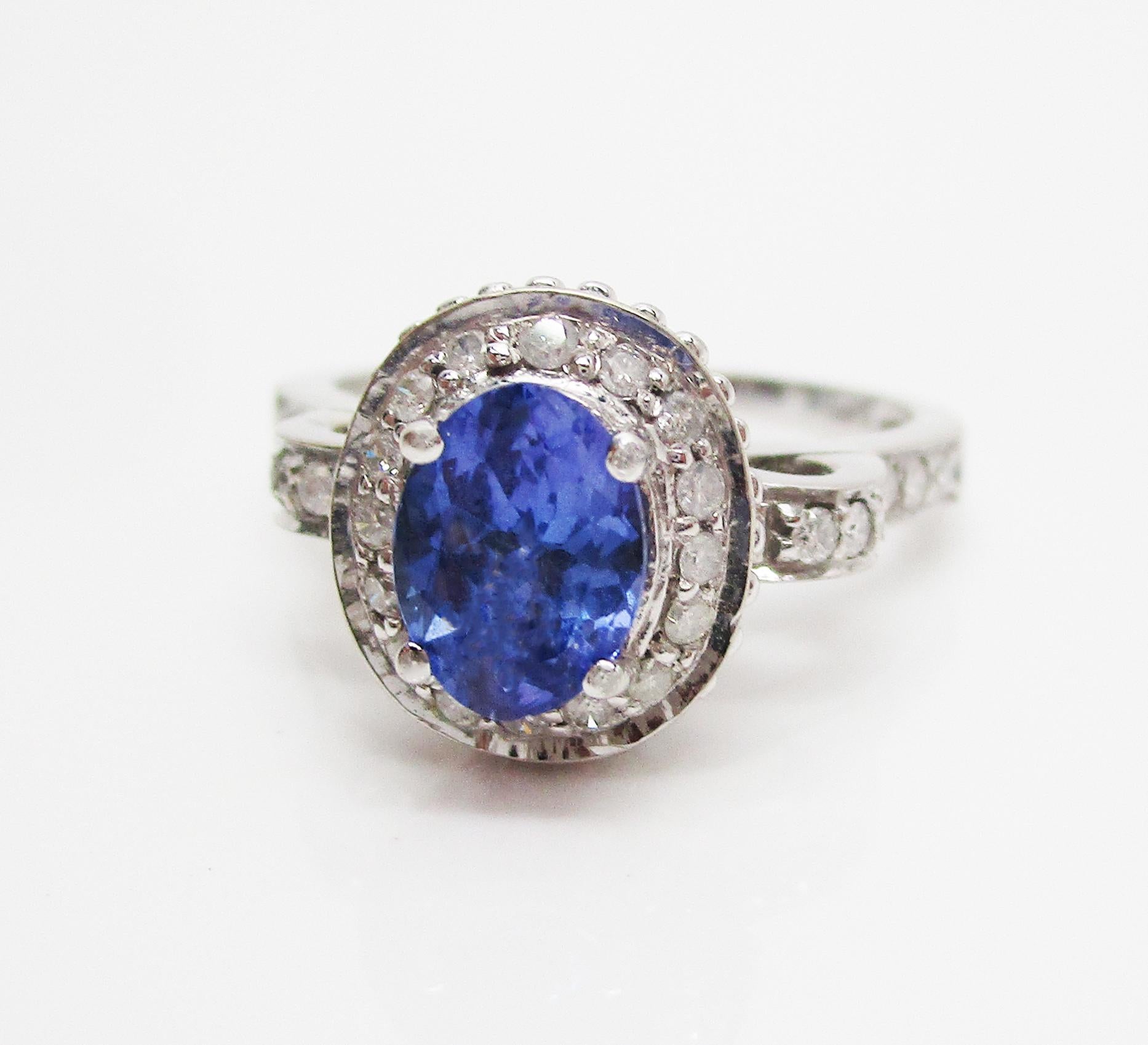 14 Karat White Gold Tanzanite and Diamond Filigree Engagement Ring In Excellent Condition In Lexington, KY