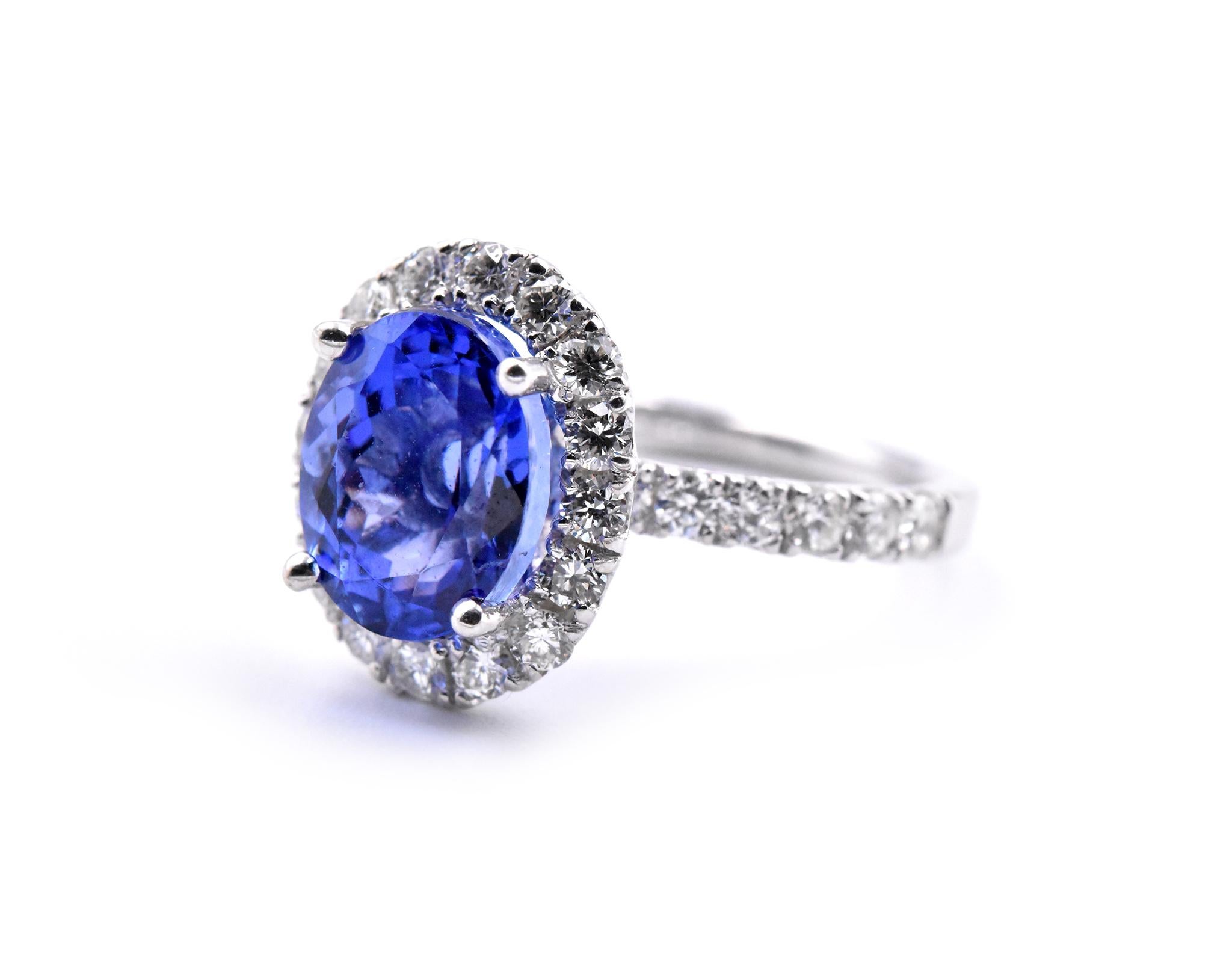 Oval Cut 14 Karat White Gold Tanzanite and Diamond Halo Ring For Sale