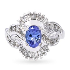 Anello con tanzanite e diamanti in oro bianco 14k