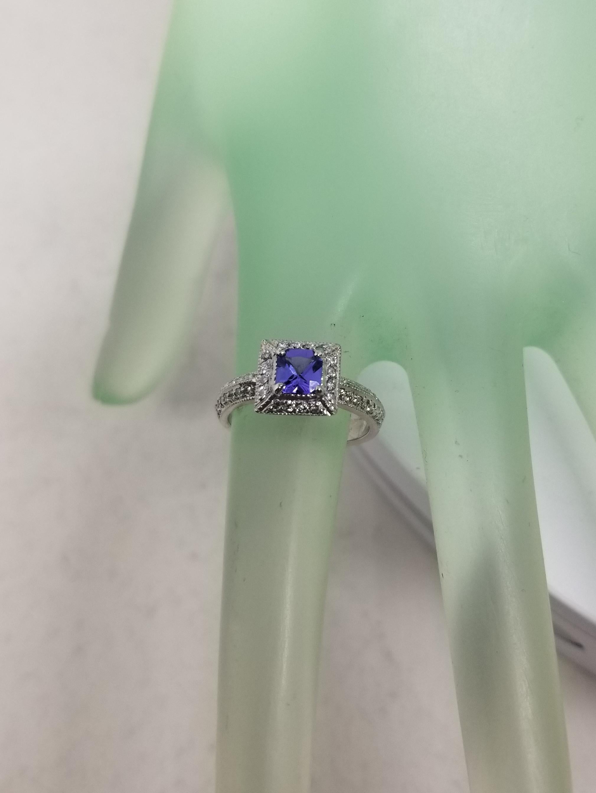 Women's or Men's 14 Karat White Gold Tanzanite and Diamond Ring with Halo For Sale
