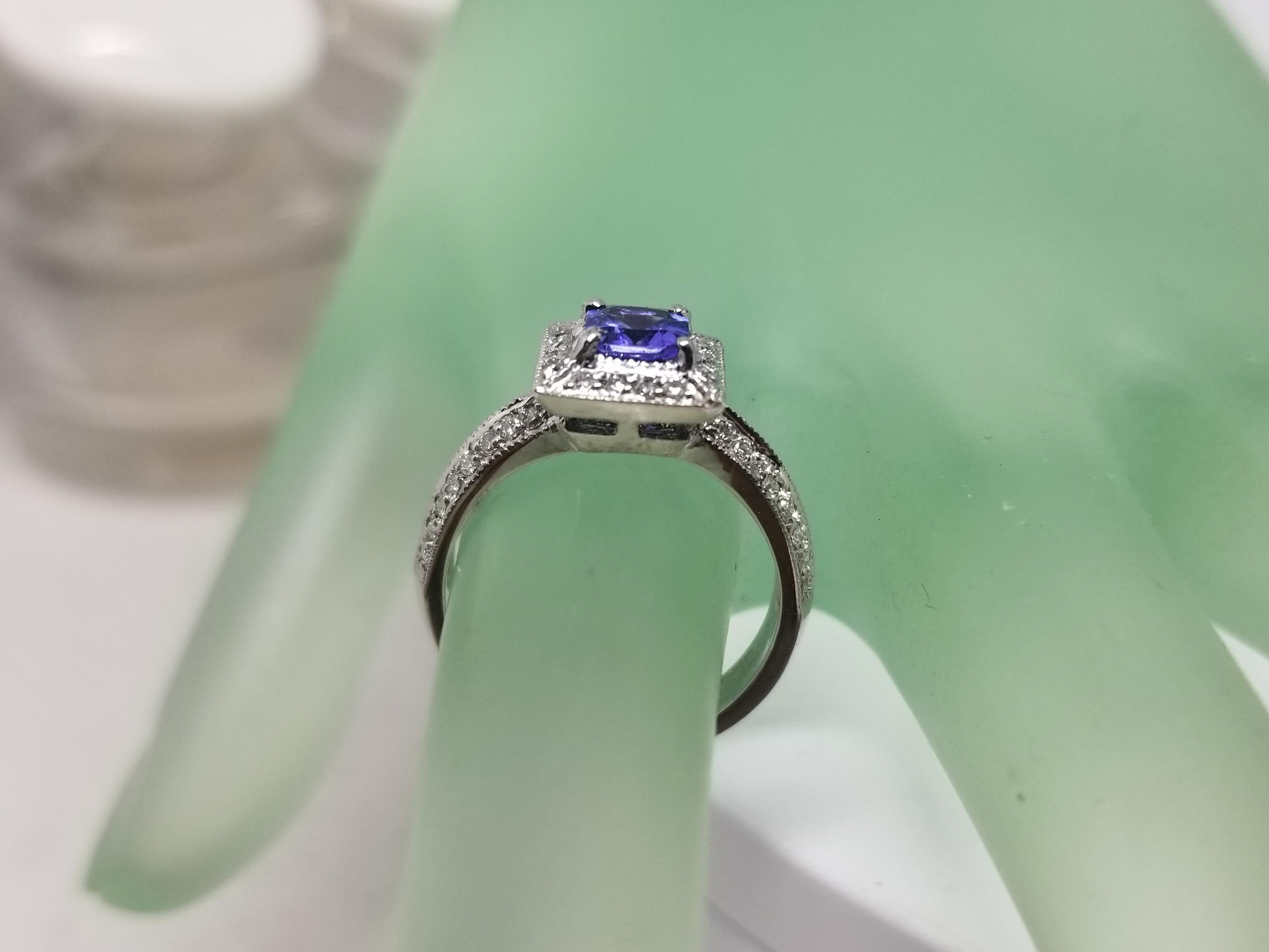14 Karat White Gold Tanzanite and Diamond Ring with Halo For Sale 1