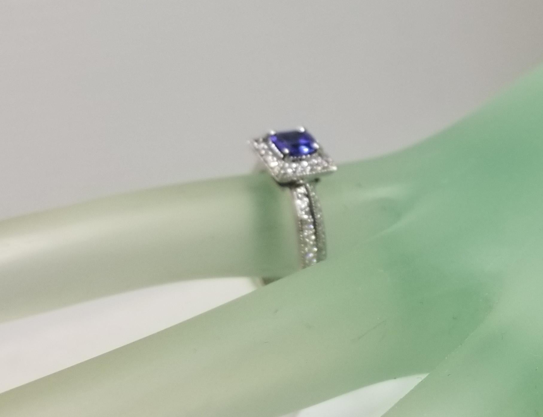 14 Karat White Gold Tanzanite and Diamond Ring with Halo For Sale 2