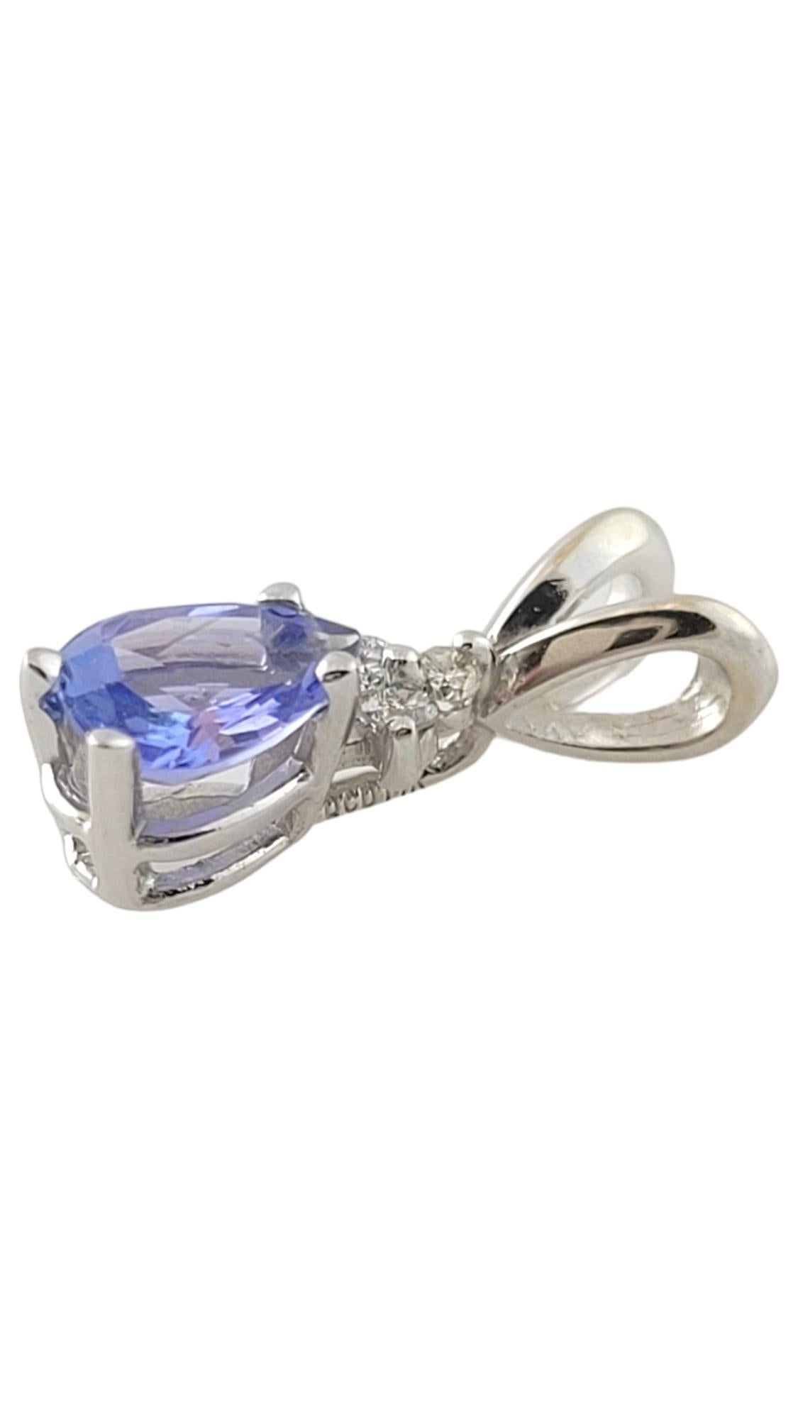 Vintage 14K White Gold Tanzanite & Diamond Pendant

This beautiful 14K gold pendant features a stunning lab tested tanzanite stone paired with 3 round brilliant cut diamonds!

Approximate total diamond weight: 0.4 dwt/ 0.6 g

Diamond color: