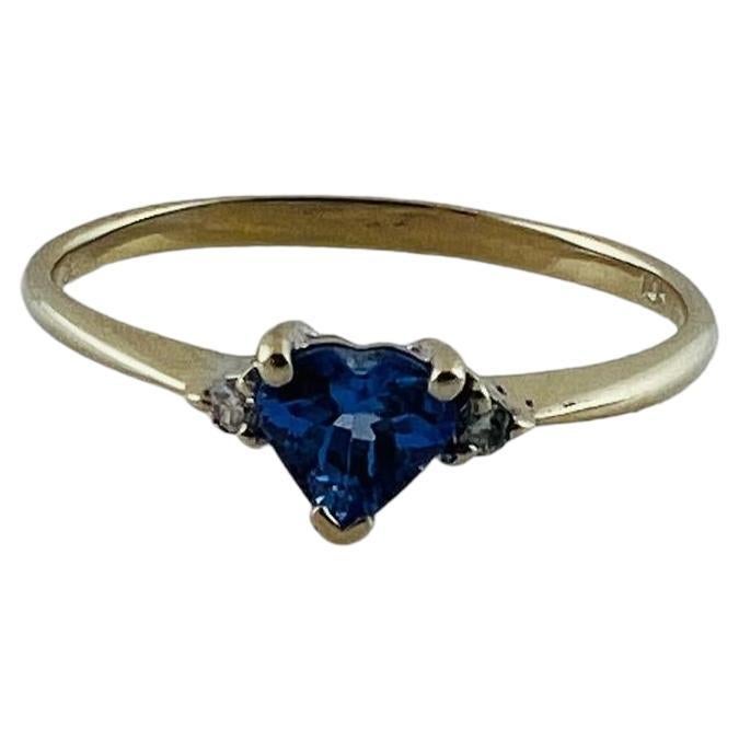 Vintage 14K White Gold Tanzanite Heart Ring Size 6.5

This gorgeous 14K gold ring has a beautiful heart shaped tanzanite stone surrounded by 2 sparkling round brilliant cut diamonds!

Approximate total diamond weight: .02 cts

Diamond color:
