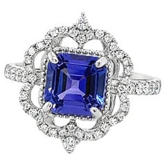 Anello aureola con tanzanite e diamanti in oro bianco 14K per gioielli di fidanzamento da donna