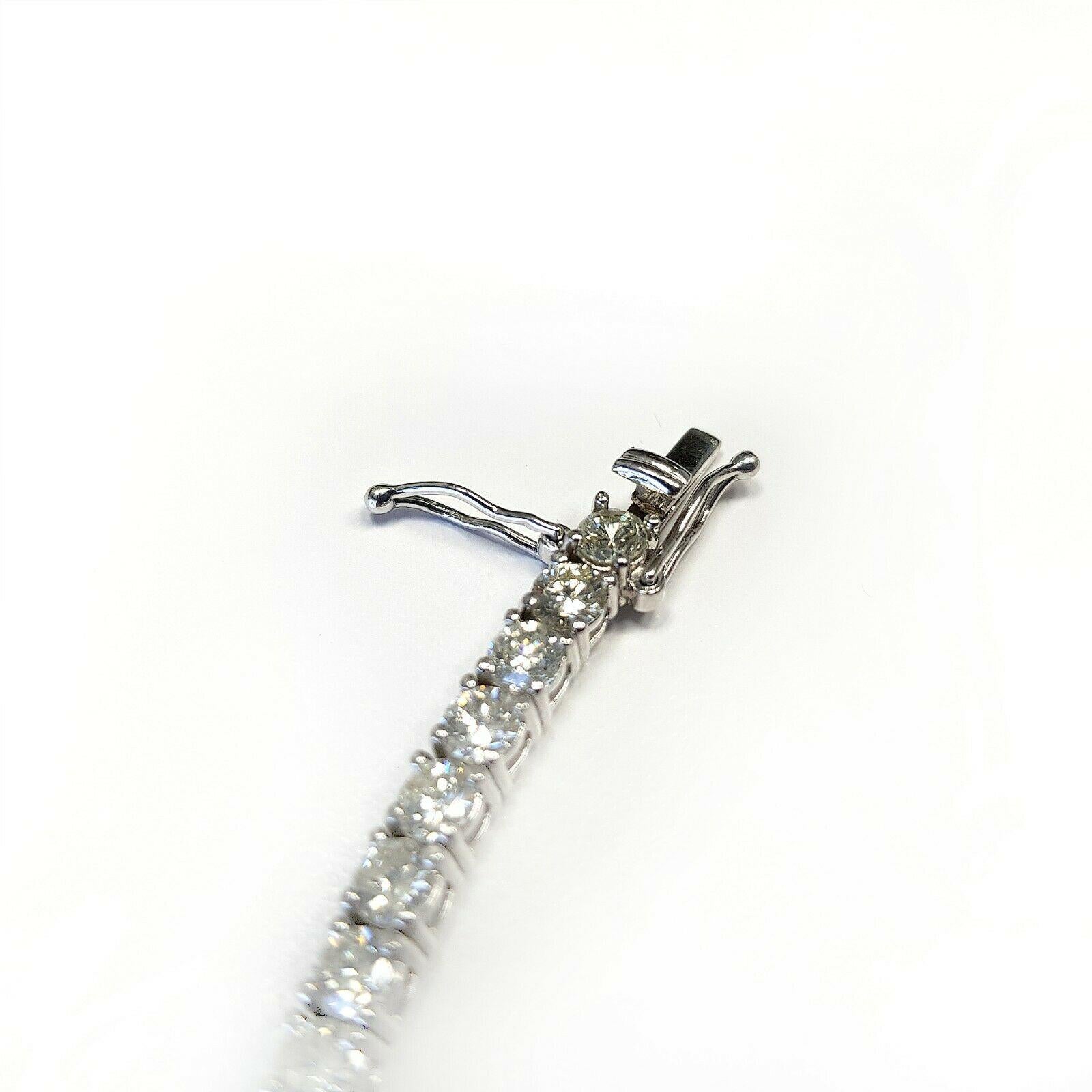 Taille ronde Bracelet tennis en or blanc 14 carats avec 48 diamants ronds pesant 8,20 carats en vente