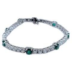 14K White Gold Tennis Bracelet with Round Cut Emeralds & Diamonds