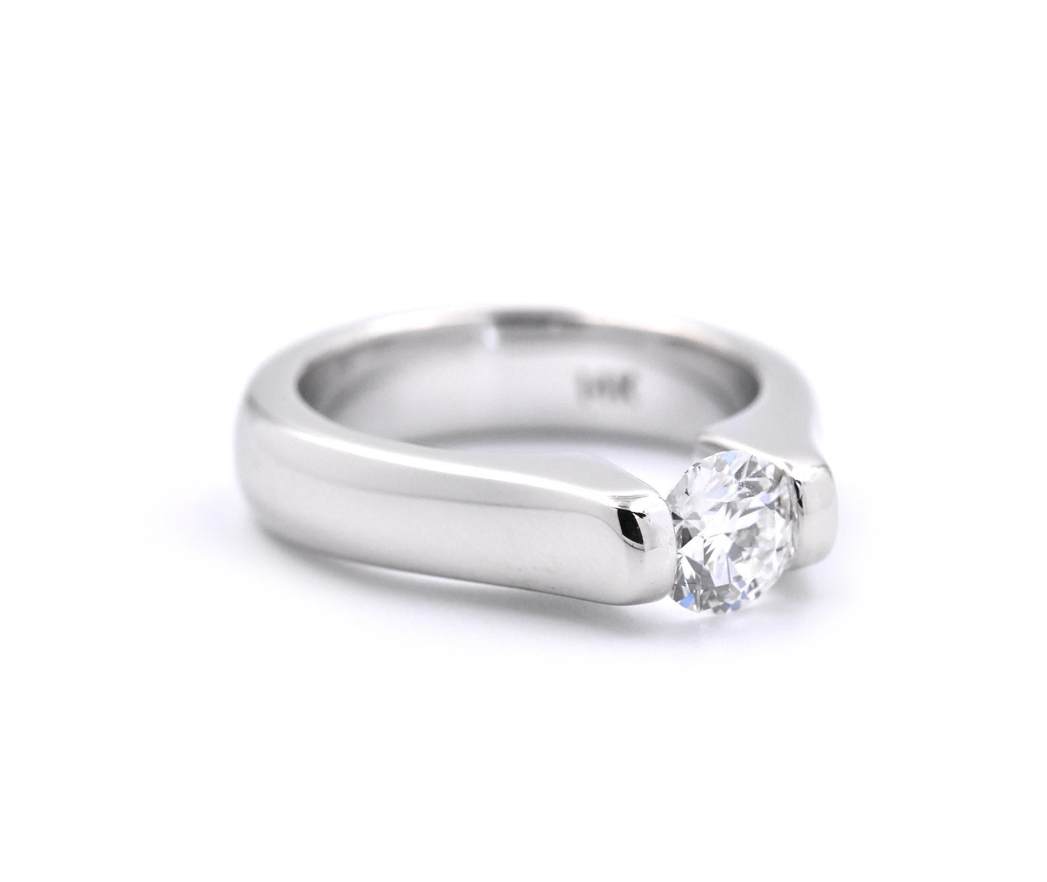 Designer: custom design
Material: 14k white gold
Center Diamond: 1 round brilliant cut = 0.75ct
Color: H
Clarity: VS1
Ring Size: 6 ¼ (please allow two additional shipping days for sizing requests)
Dimensions: ring measures 5.20mm wide
Weight: 9.35