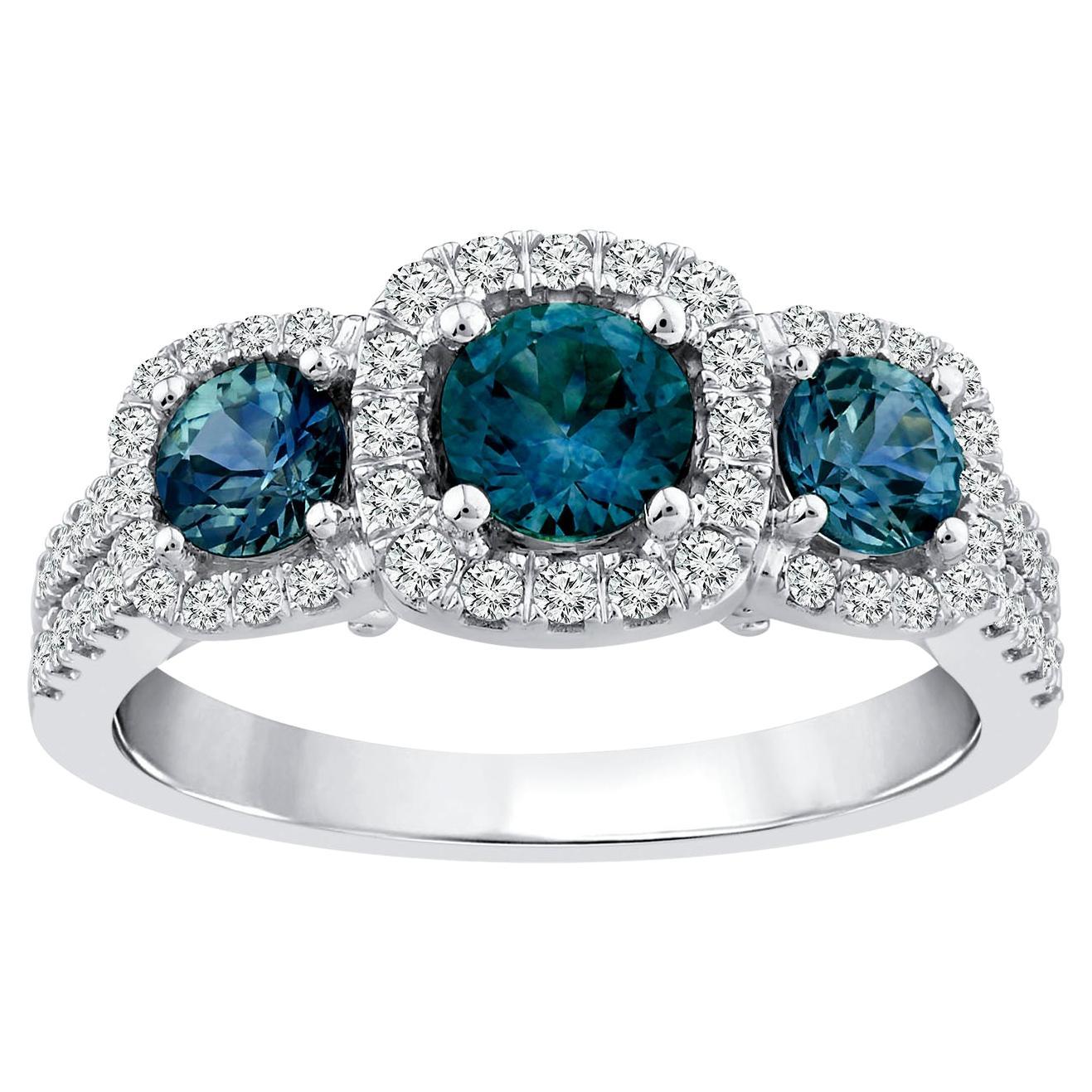 Ring aus 14 Karat Weißgold mit drei Steinen, blauem Saphir und Diamant