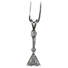14k White Gold Triangle cut Diamond pendant weighing .51pts.