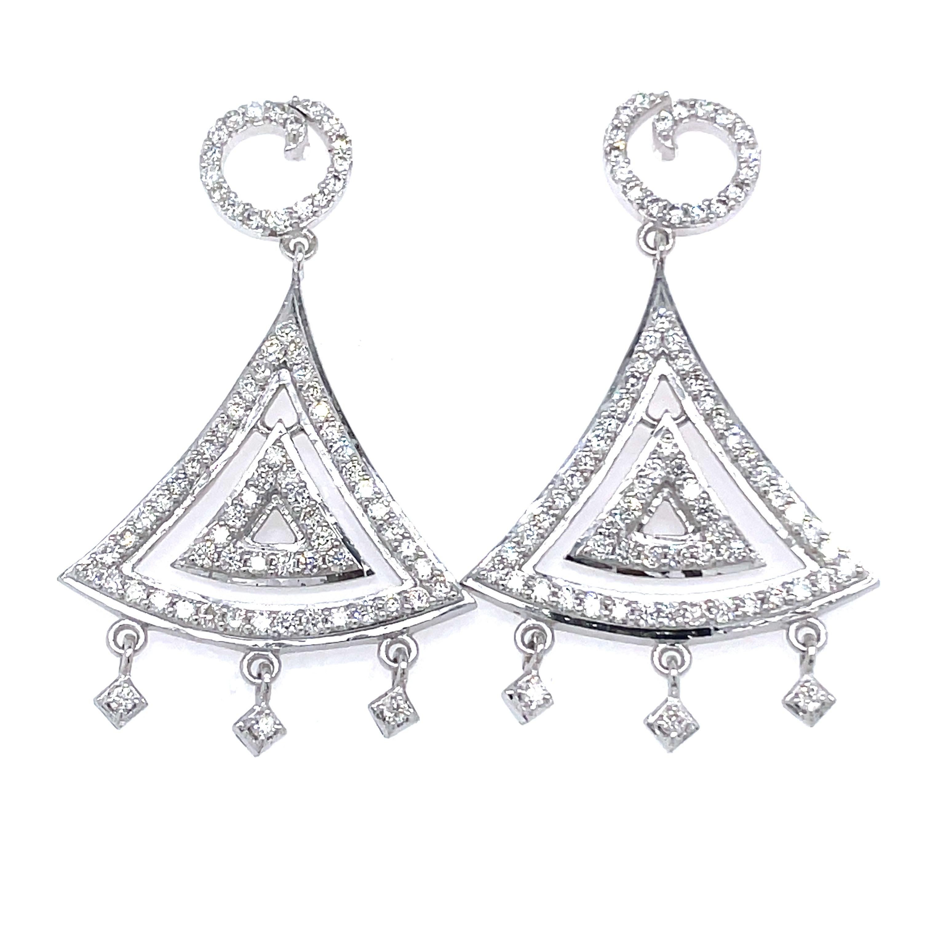 14k White Gold Triangle Shaped Chandelier Earrings

Prepare to defy convention and flaunt your unique style with these 14k White Gold Triangle Chandelier Earrings – where geometry meets glamour!

With 2.23 carats of gleaming diamonds and 11.23 grams