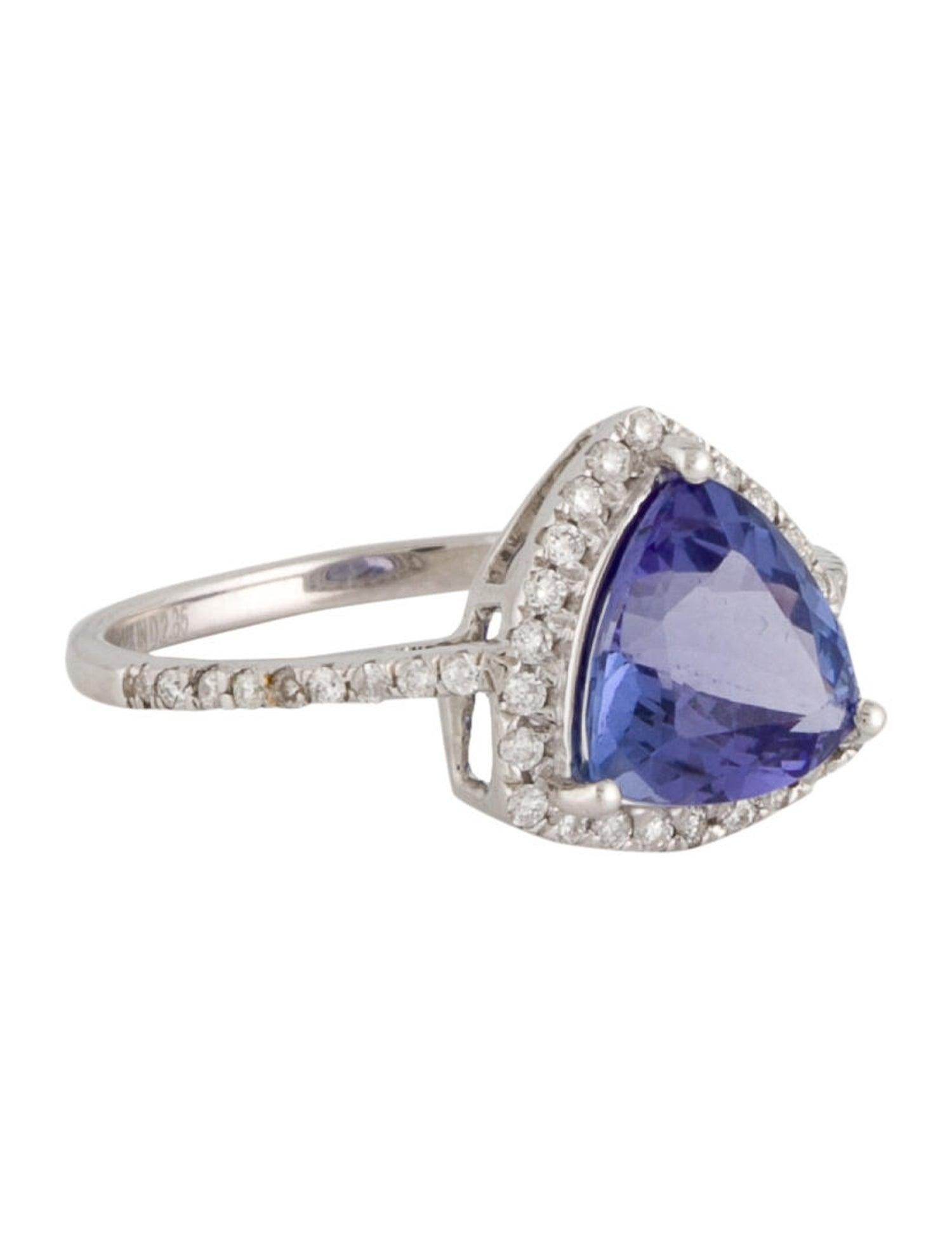 Introducing our 14K White Gold Cocktail Ring, a masterpiece that marries modern elegance with timeless design. At its heart lies a captivating 2.15 carat faceted triangular Tanzanite, boasting a deep purple hue that enchants at first glance. This