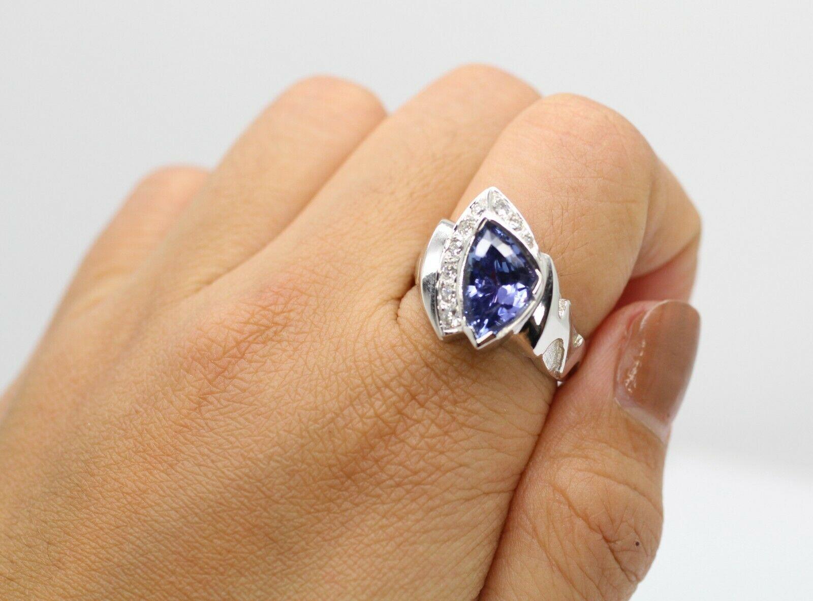 Trillion Cut 14 Karat White Gold Trillion-Cut Violet-Blue Tanzanite and Diamonds Ring