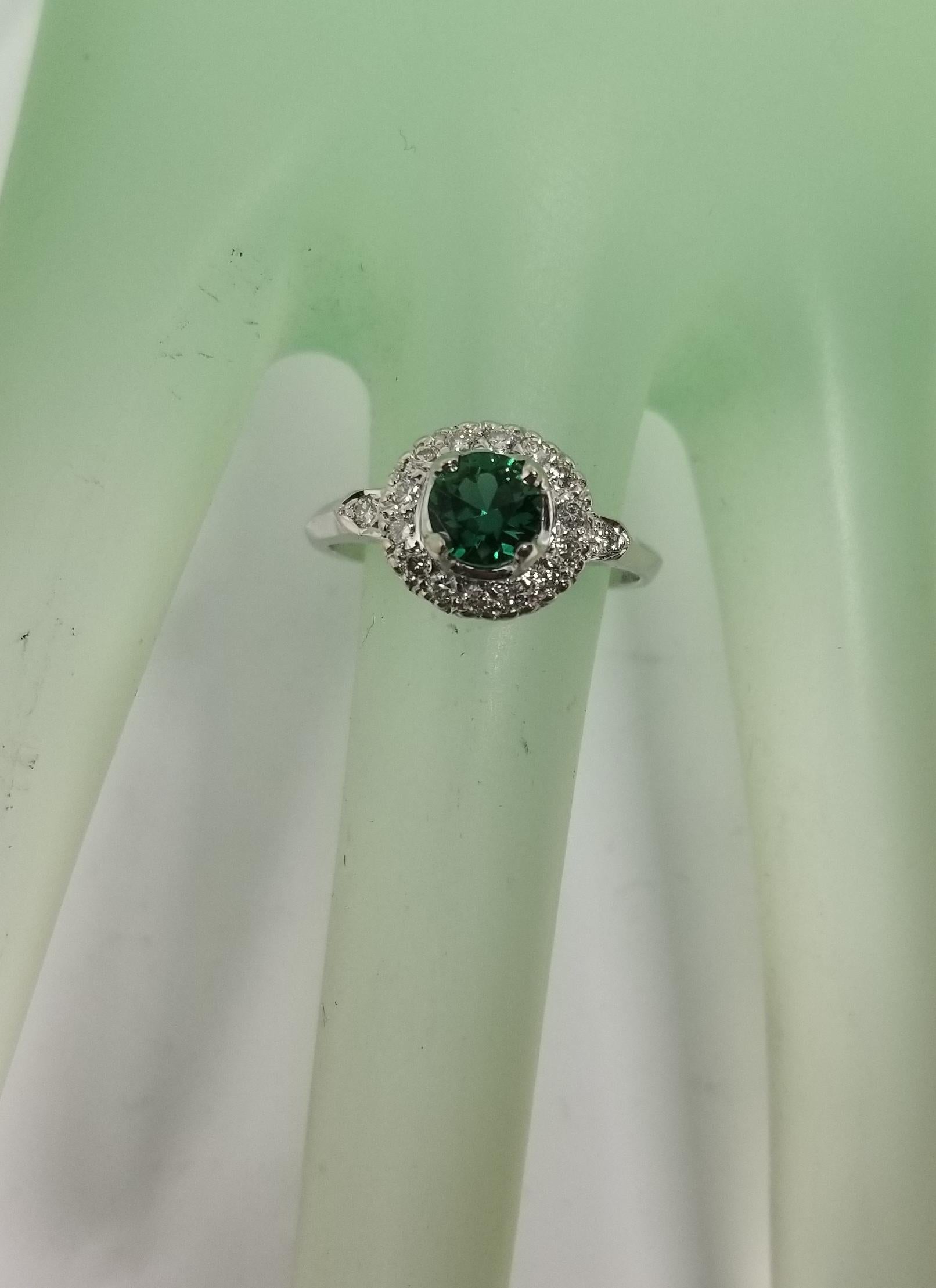 Women's 14 Karat White Gold Tsavorite and Diamond Halo Ring For Sale