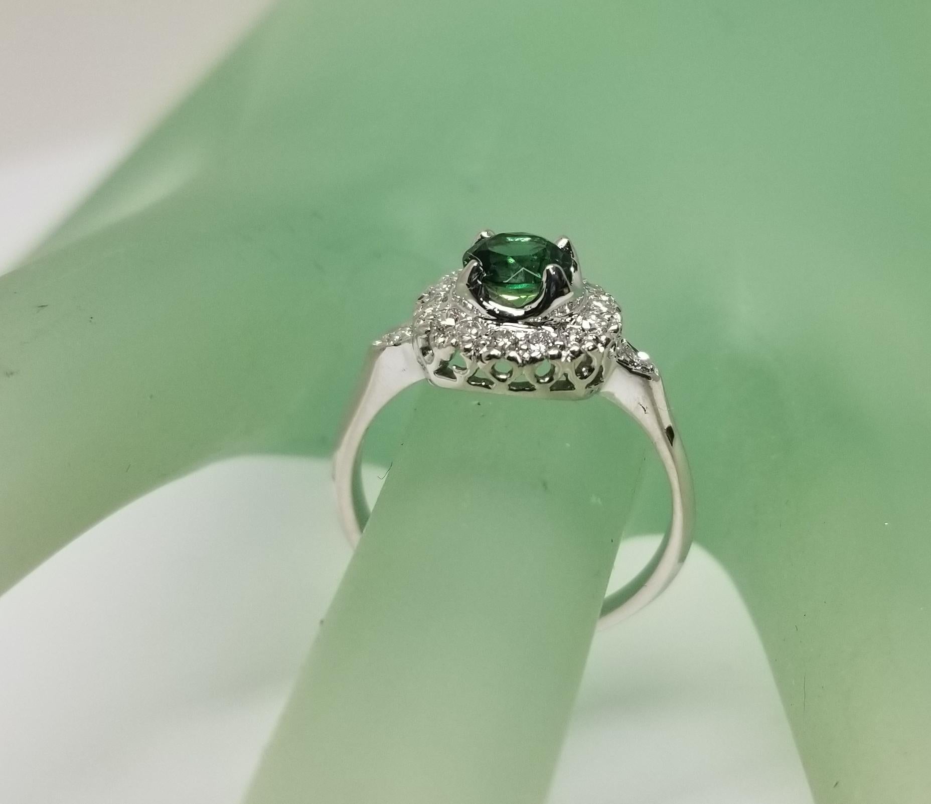 14 Karat White Gold Tsavorite and Diamond Halo Ring For Sale 1